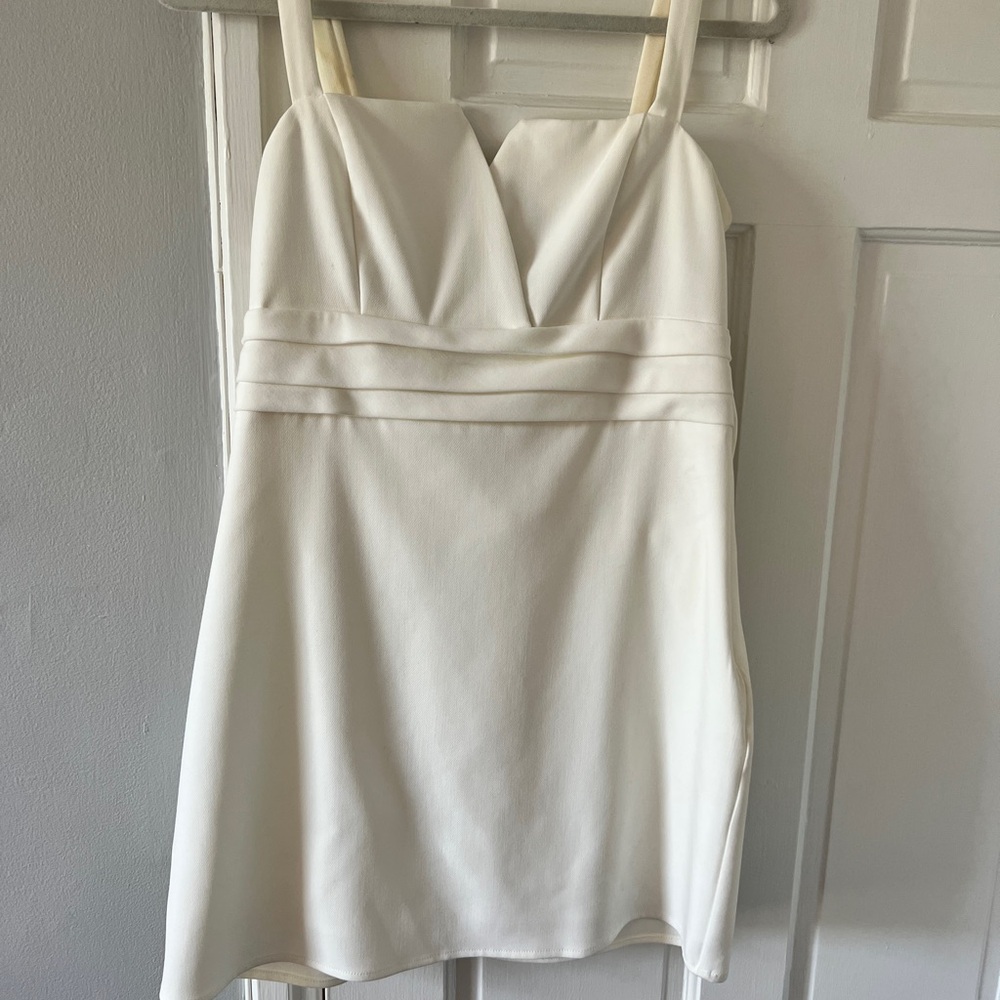 White bow back dress. Mini size large. Bloomingdale’s